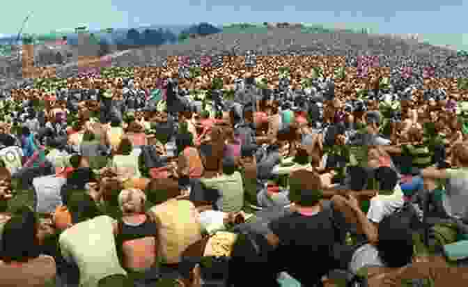A Crowd Of People Gathered At The Woodstock Music And Art Fair In 1969 A History Of Music Festivals