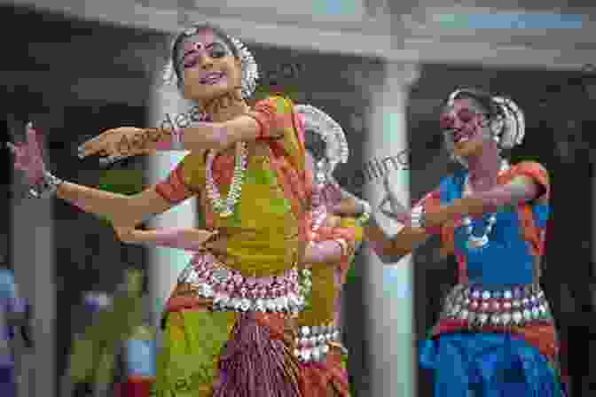 A Young Woman In Traditional Indian Attire Dances Gracefully During A Vibrant Festival, Surrounded By A Kaleidoscope Of Colors Photo Essay: Beauty Of Slovenia: Volume 67 (Travel Photo Essays)