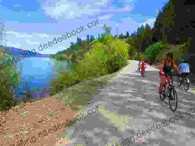 Hikers And Cyclists Enjoying The Okanagan Rail Trail Trails Around Kelowna British Columbia